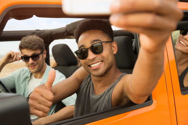 group-of-happy-young-people-taking-selfie-2021-08-26-18-21-50-utc.jpg